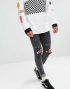 New Look Skinny Jeans With Rips And Paint Spray In Black Wash - Black