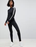 Adidas Originals Three Stripe Stirrup Jumpsuit In Black - Black