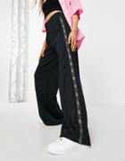 Nike Repeat Tape High-waisted Wide Leg Polyknit Pants In Black