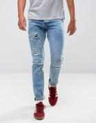 Asos Slim Jeans In Vintage Mid Wash Blue With Rip And Repair - Blue