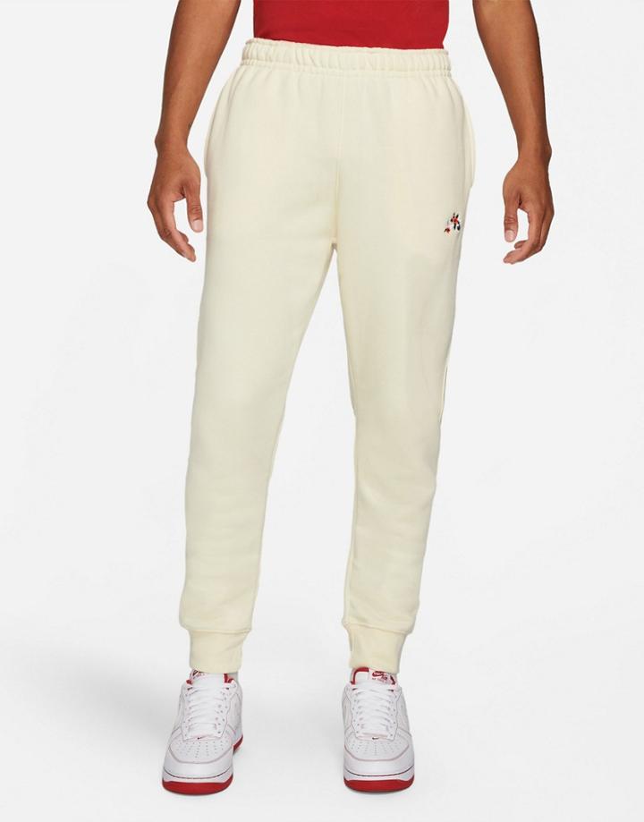 Nike Logo Twist Pack Embroidered Logo Cuffed Sweatpants In Cream-white