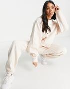 Nike Collection Fleece Loose-fit Cuffed Sweatpants In Light Sand-neutral