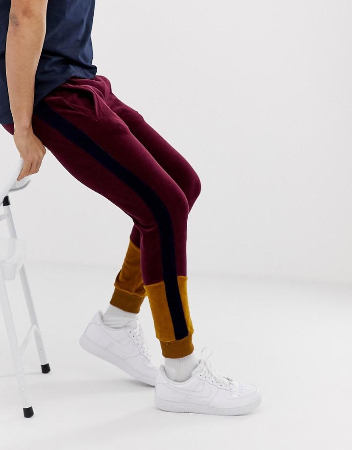 Asos Design Skinny Sweatpants In Velour With Color Blocking Panels In Red - Green