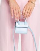 Truffle Collection Micro Mini Grab Bag With Strap In Blue-blues