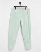 Nike Club Cuffed Sweatpants In Pale Green
