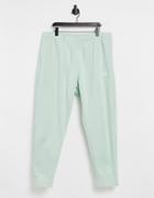 Nike Club Cuffed Sweatpants In Pale Green