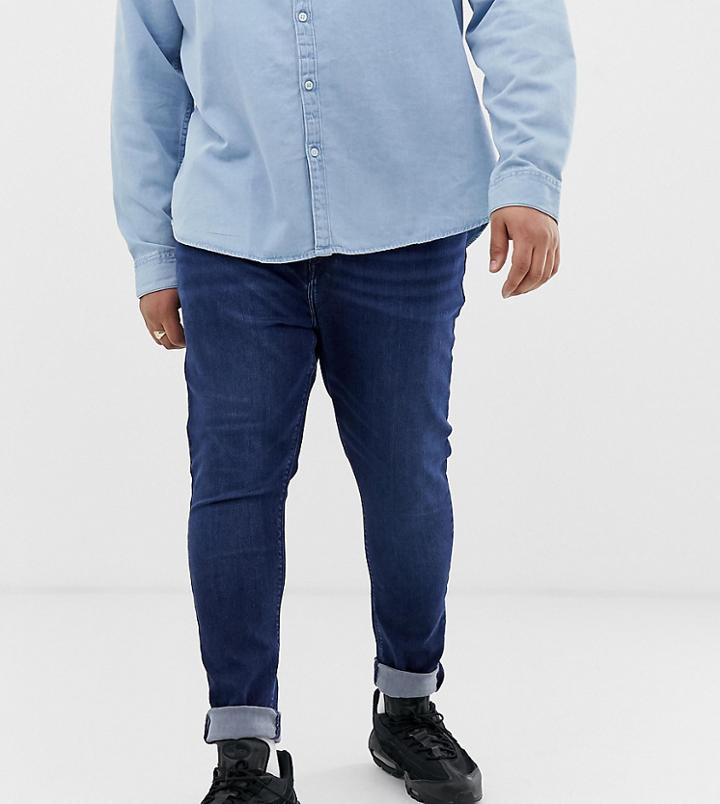 Asos Design Plus Spray On Jeans In Power Stretch Denim In Dark Wash Blue - Blue