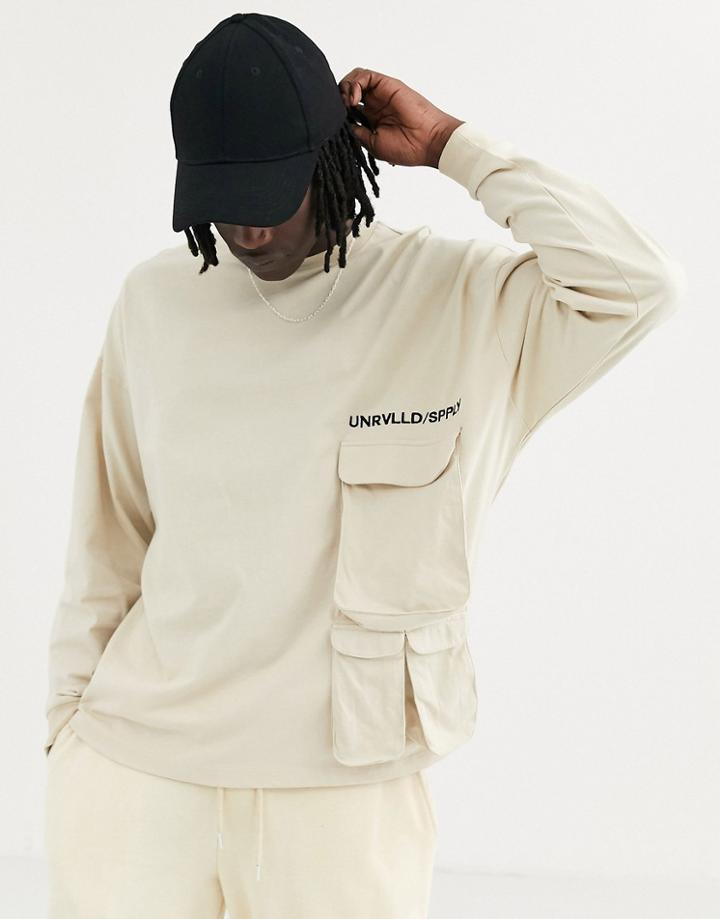 Asos Design Heavyweight Oversized Long Sleeve T-shirt With Utility Pocket Embroidery And Unrivalled Supply Logo-beige