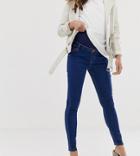 Asos Design Maternity Ridley High Waisted Skinny Jeans In Rich Mid Blue Wash With Over The Bump Waistband