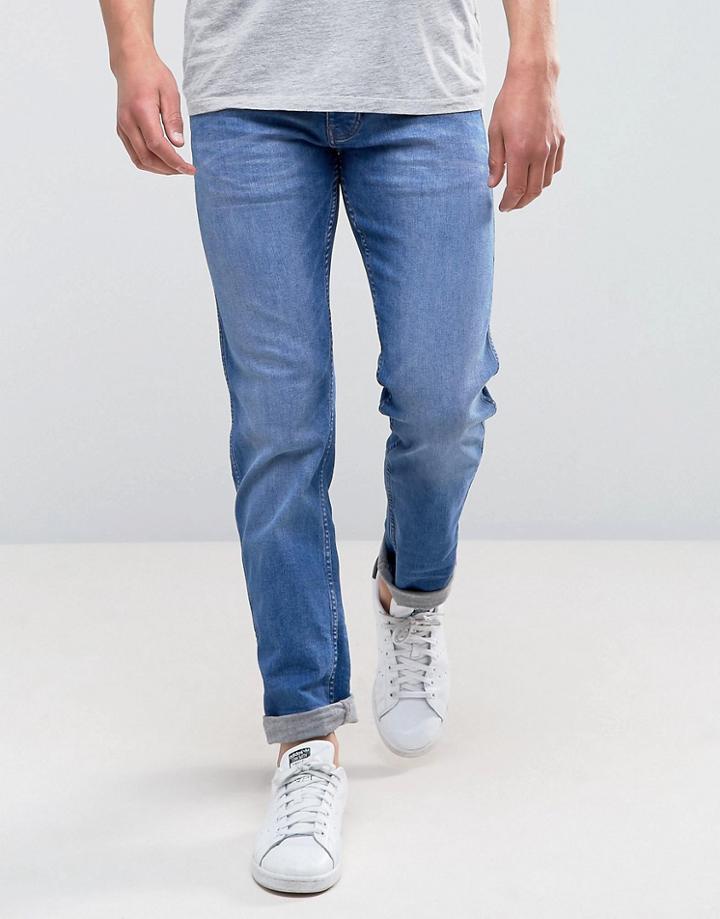 Wrangler Slim Fit Jeans In Dark Pop - Blue