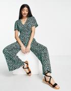 Asos Design Bubble Short Sleeve Tea Culotte Jumpsuit In Black And Green Floral-multi