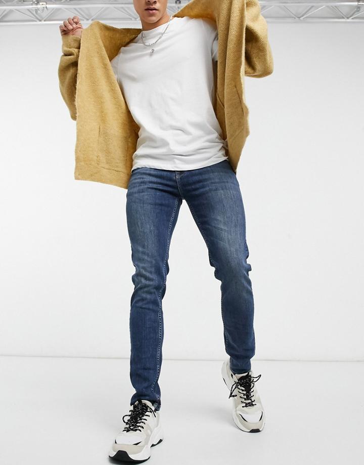 Asos Design Skinny Jeans In Mid Greencast Wash-blues