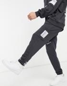 The Couture Club Relaxed Printed Sweatpants In Charcoal-grey