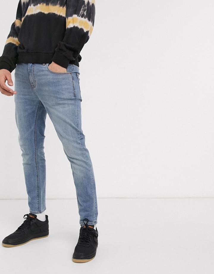Asos Design Ankle Grazer Skinny Jeans In Light Wash Blue