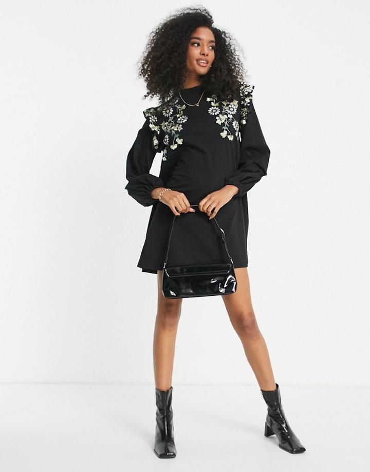 Asos Design Mini Swing Dress With Shoulder Ruffle And Daisy Embroidery In Black