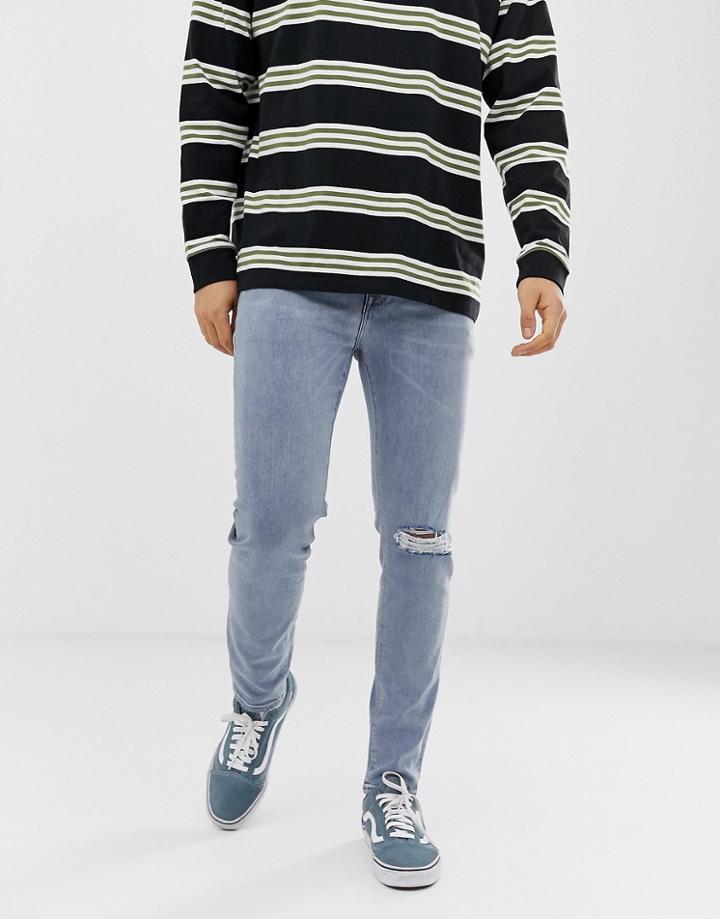 Asos Design 12.5oz Skinny Jeans In Light Wash Blue With Knee Rips - Blue