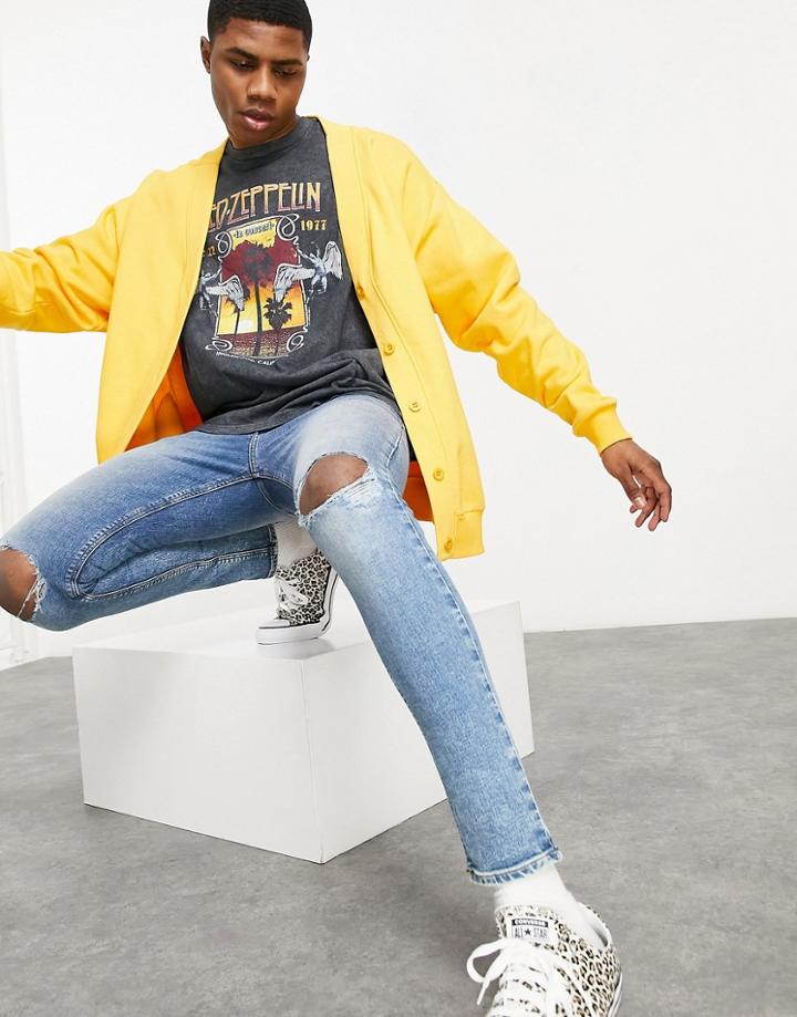 Asos Design Spray On Jeans With Power Stretch In Vintage Mid Wash With Knee Rips-blues