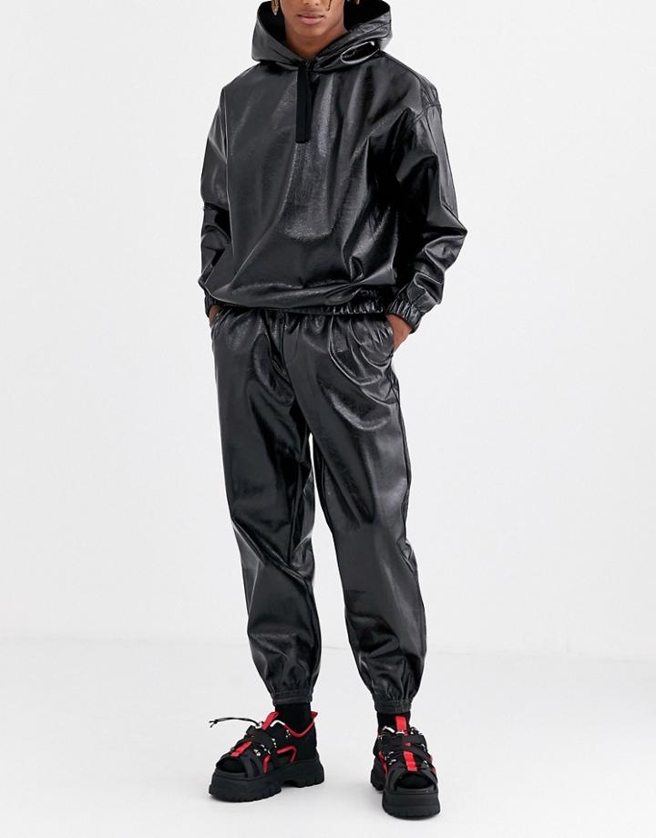 Asos Design Two-piece Tapered Sweatpants In Wet Look Fabric In Black