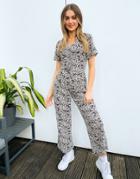 Asos Design Short Sleeve Tea Culotte Jumpsuit In Ditsy Floral Print-multi