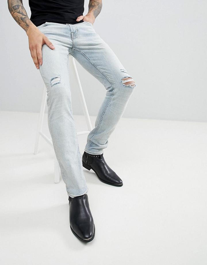 Allsaints Tapered Fit Jeans With Rips In Blue - Blue