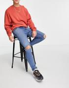 Asos Design Skinny Jeans With 'less Thirsty' Wash In Mid Blue With Knee Rips-blues