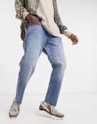 Asos Design Classic Rigid Jeans In Vintage Mid Wash Blue With Raw Hem