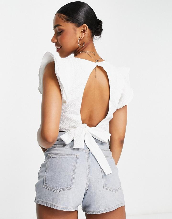 The Frolic Textured Frill Sleeve Sleeveless Blouse In White