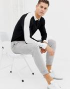 Asos Design Long Sleeve Polo Shirt With Contrast Shoulder Panel In Black - Black