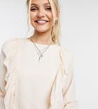 In The Style Exclusive Ruffle Detail Top In Cream-white