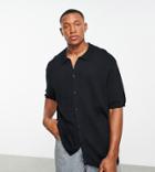Asos Design Oversized Knitted Button Through Polo In Black