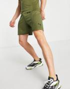 Puma Training Formknit Seamless 7 Shorts In Khaki-green