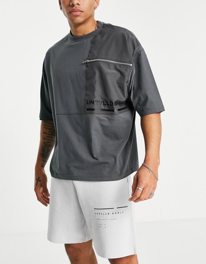 Asos Unrvlld Spply Relaxed Short With Logo Print In Gray-grey