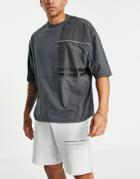 Asos Unrvlld Spply Relaxed Short With Logo Print In Gray-grey