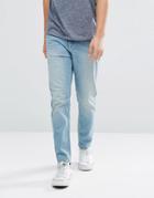 Asos Tapered Jeans In Light Wash Blue - Blue