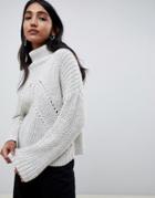 Asos Design Roll Neck Sweater In Moving Rib Stitch - Stone