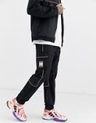 Adidas Originals Adiplore Sweatpants With Cargo Pockets In Black