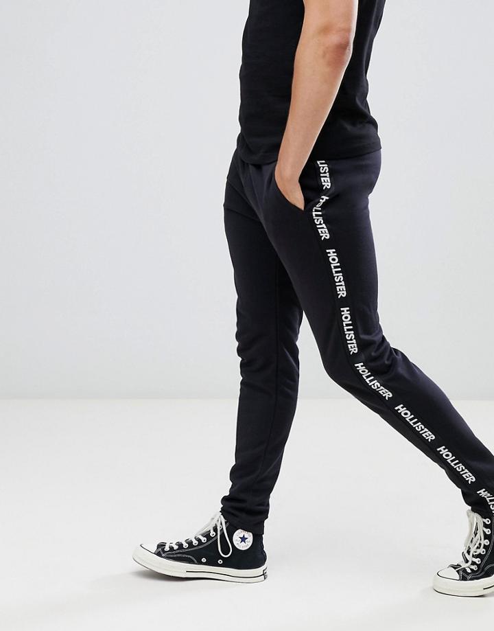 Hollister Logo Side Tape Track Pants In Black - Black