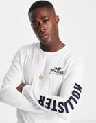 Hollister Large Chest & Arm Logo Long Sleeve Top In White