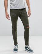 Asos Super Skinny 5 Pocket Pants In Dark Green With Rips And Distressing - Green