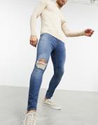 Asos Design Spray On Jeans With Power Stretch In Vintage Dark Wash With Rips-blues