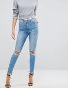 Asos Ridley High Waist Skinny Jeans In Trinity Mottled Light Stone Wash With Busts - Blue