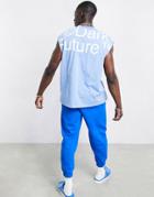Asos Dark Future Oversized Tank In Blue With Super Sized Logo Print-blues