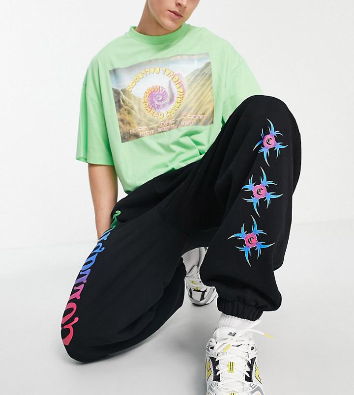 Collusion Oversized Sweatpants With Fantasy Prints In Black