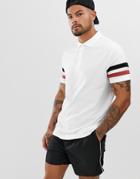 Asos Design Organic Polo Shirt With Contrast Sleeve Stripe In White - White