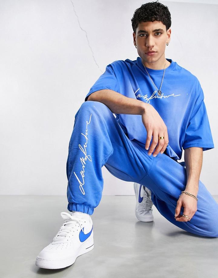 Asos Dark Future Relaxed Sweatpants With Wash In Blue - Part Of A Set