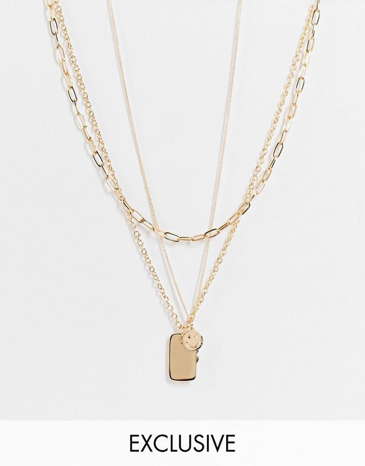 Reclaimed Vintage Inspired Multirow Necklace With Happy Face And Peace Flower Charms In Gold