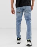 Asos Design Slim Jeans In Mid Wash Blue With Bum Rips - Blue
