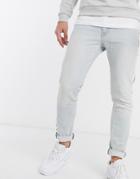 Levi's 512 Reflective Side Tape Slim Tapered Low Rise Jeans In Bleach Light Wash-blue