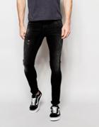 Asos Extreme Super Skinny Jeans With Knee Rips In Washed Black - Black