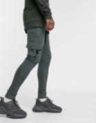 Asos Design Skinny Sweatpants With Cargo Pocket In Washed Black
